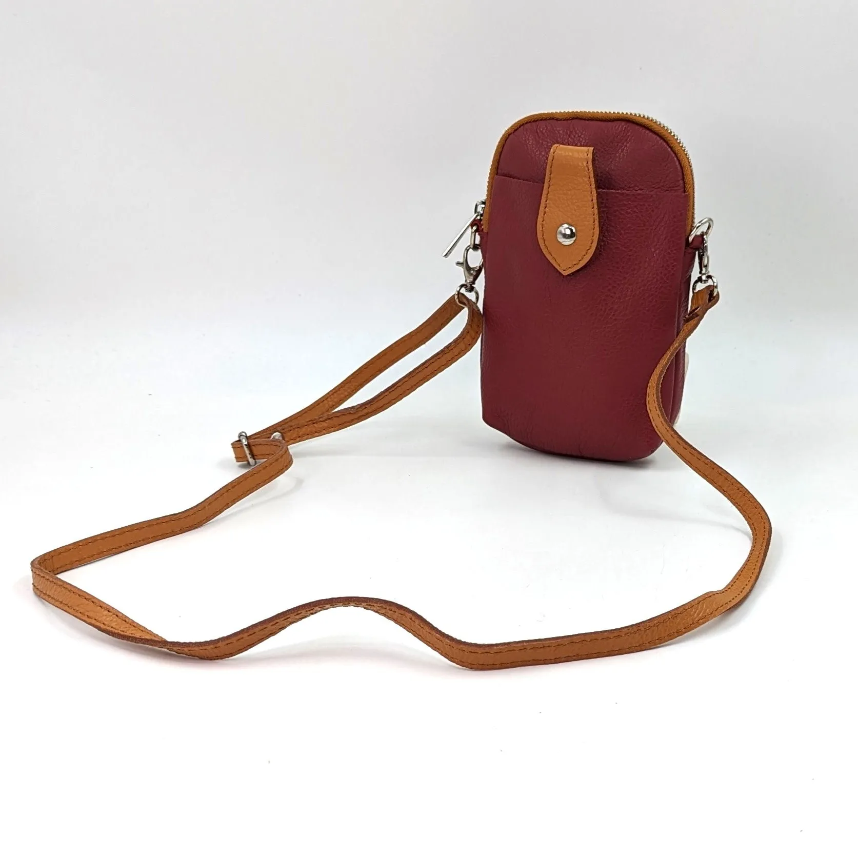 Crossbody mini leather bag with front and back compartments and poppers