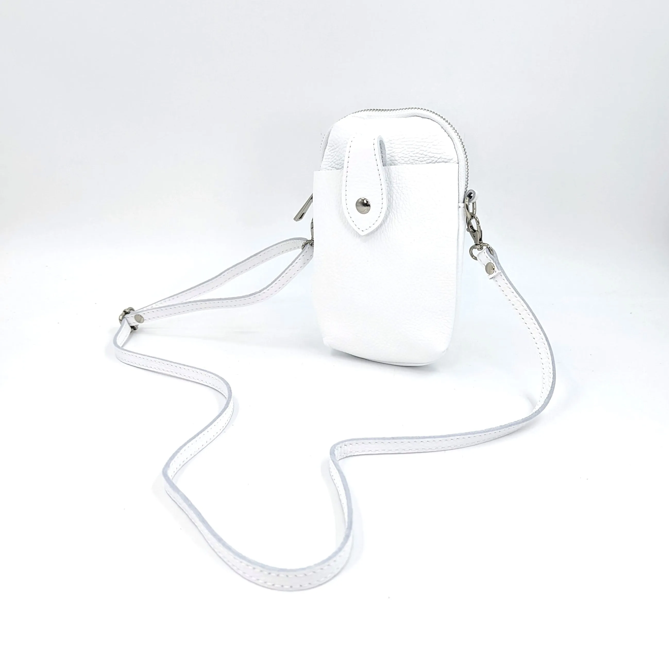 Crossbody mini leather bag with front and back compartments and poppers