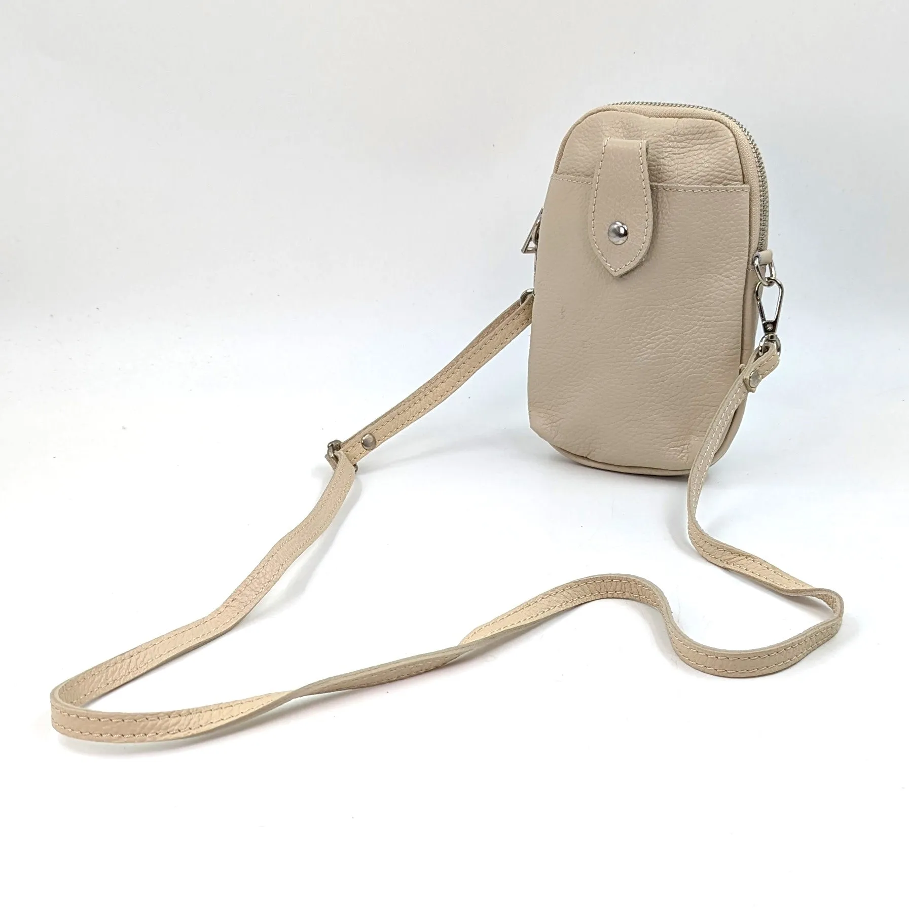 Crossbody mini leather bag with front and back compartments and poppers