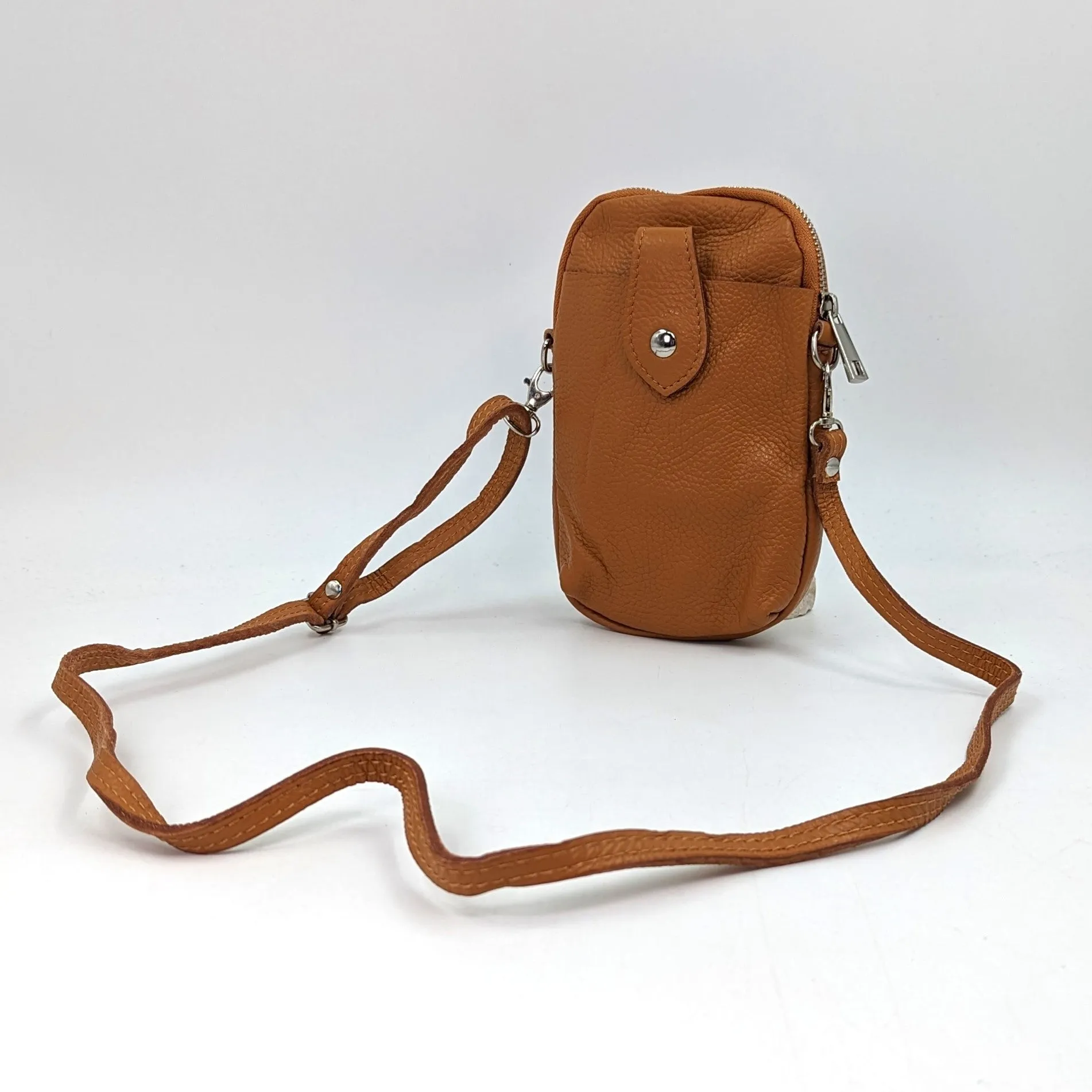 Crossbody mini leather bag with front and back compartments and poppers