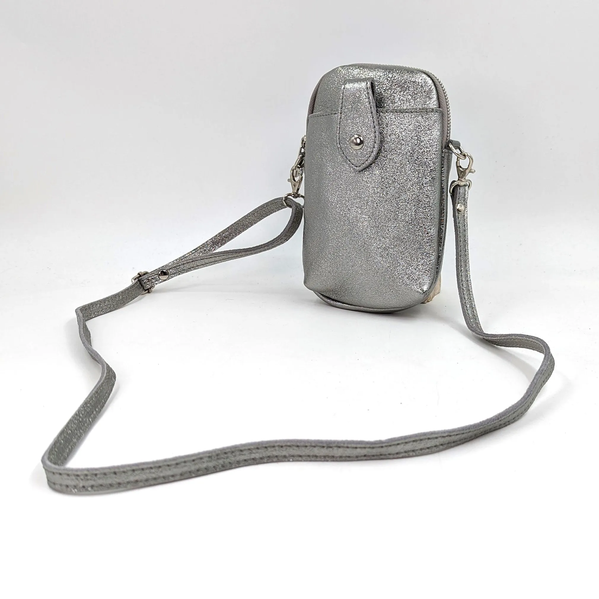 Crossbody mini leather bag with front and back compartments and poppers