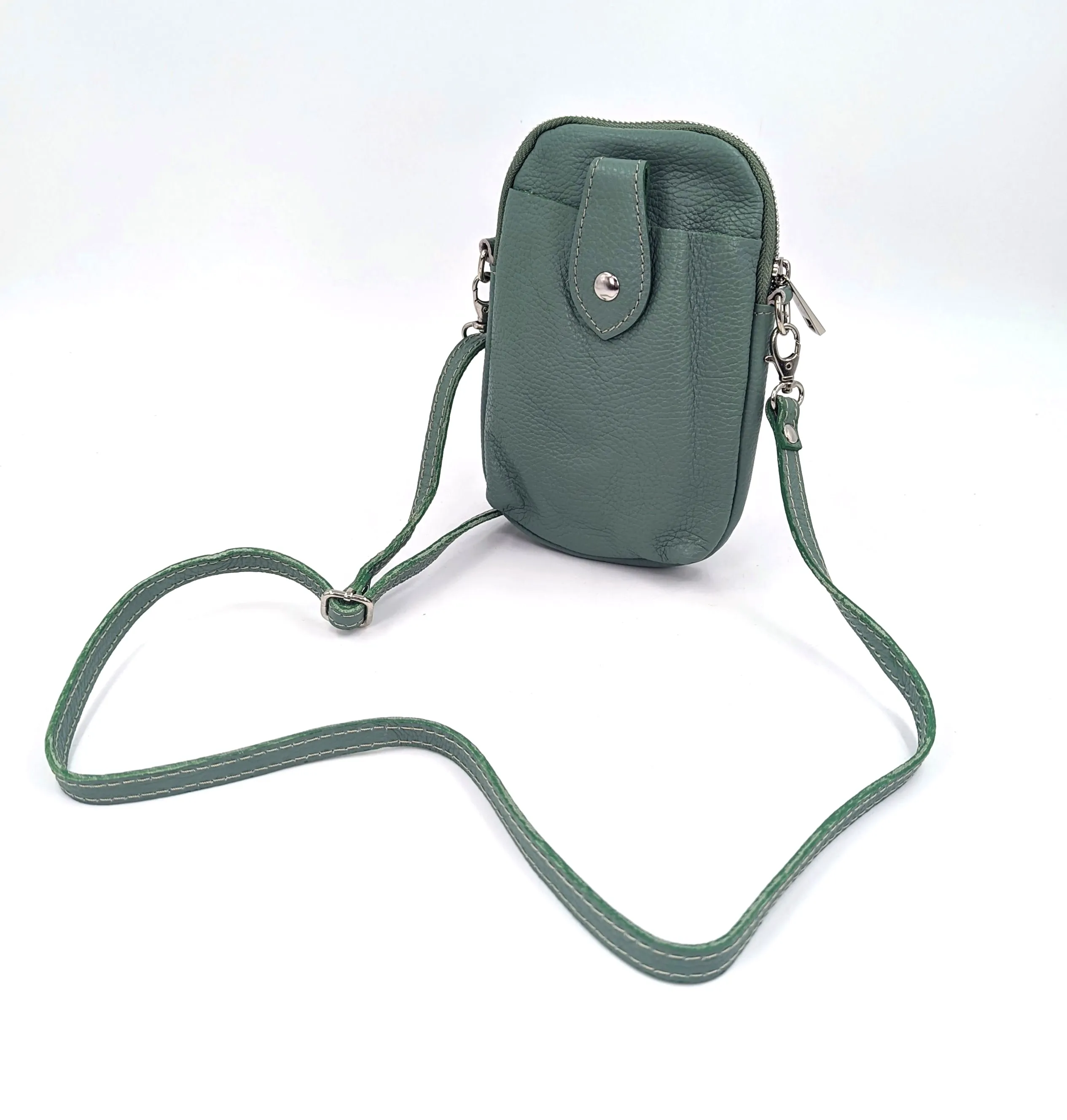 Crossbody mini leather bag with front and back compartments and poppers