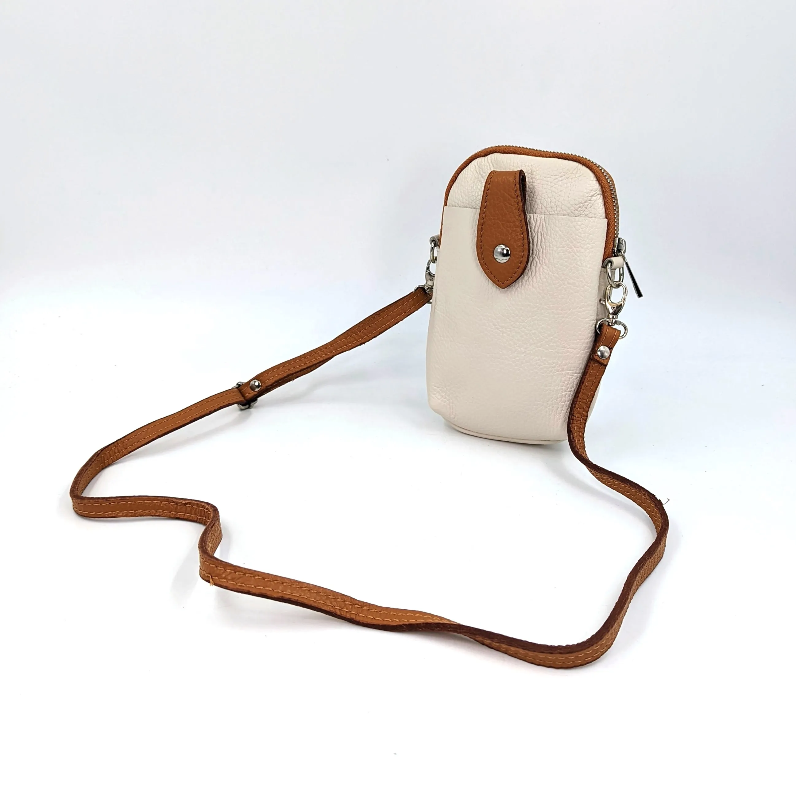 Crossbody mini leather bag with front and back compartments and poppers