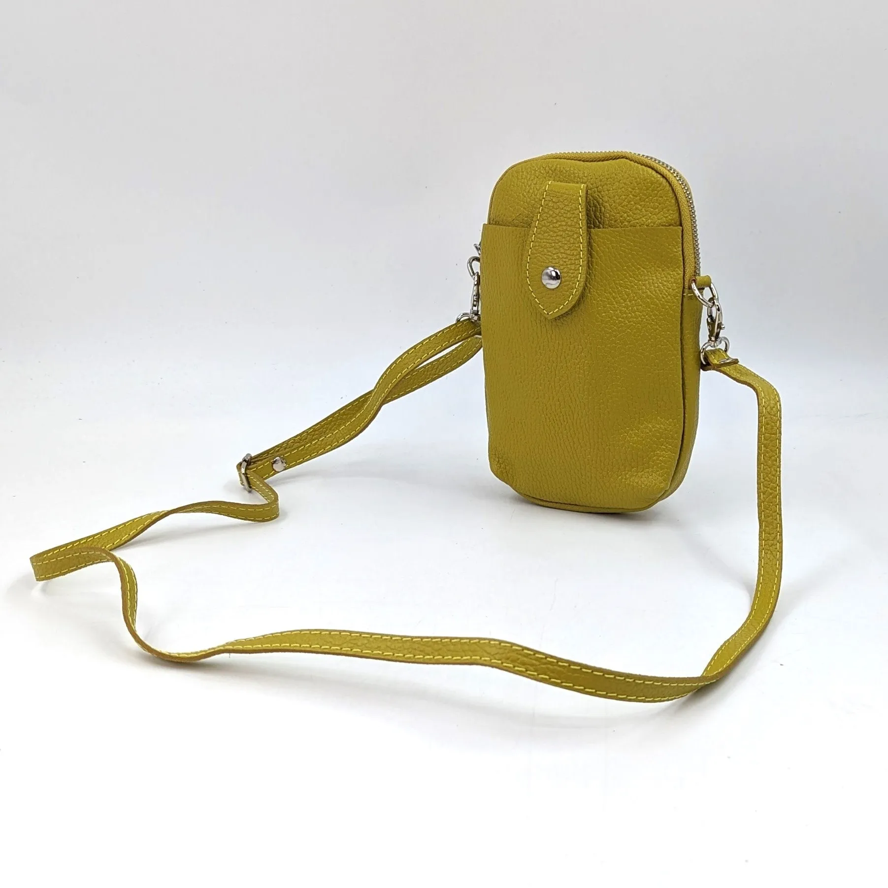 Crossbody mini leather bag with front and back compartments and poppers