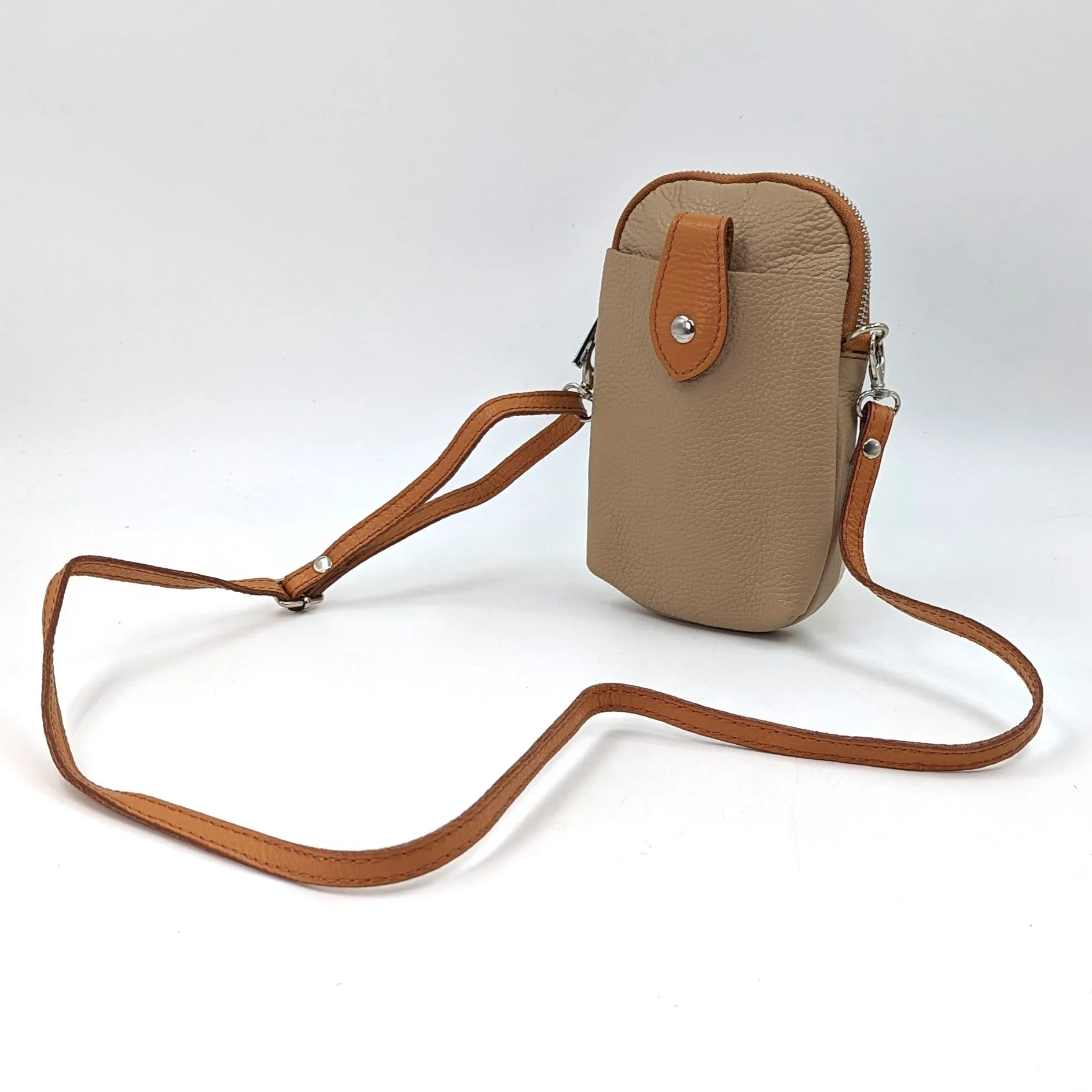 Crossbody mini leather bag with front and back compartments and poppers
