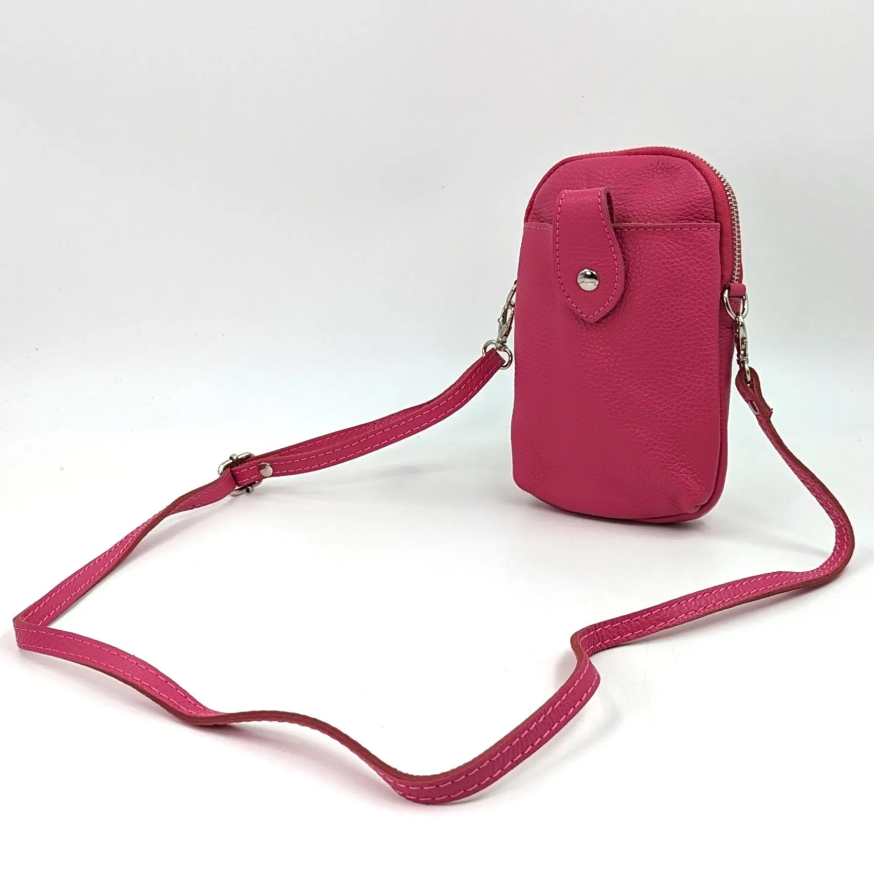 Crossbody mini leather bag with front and back compartments and poppers