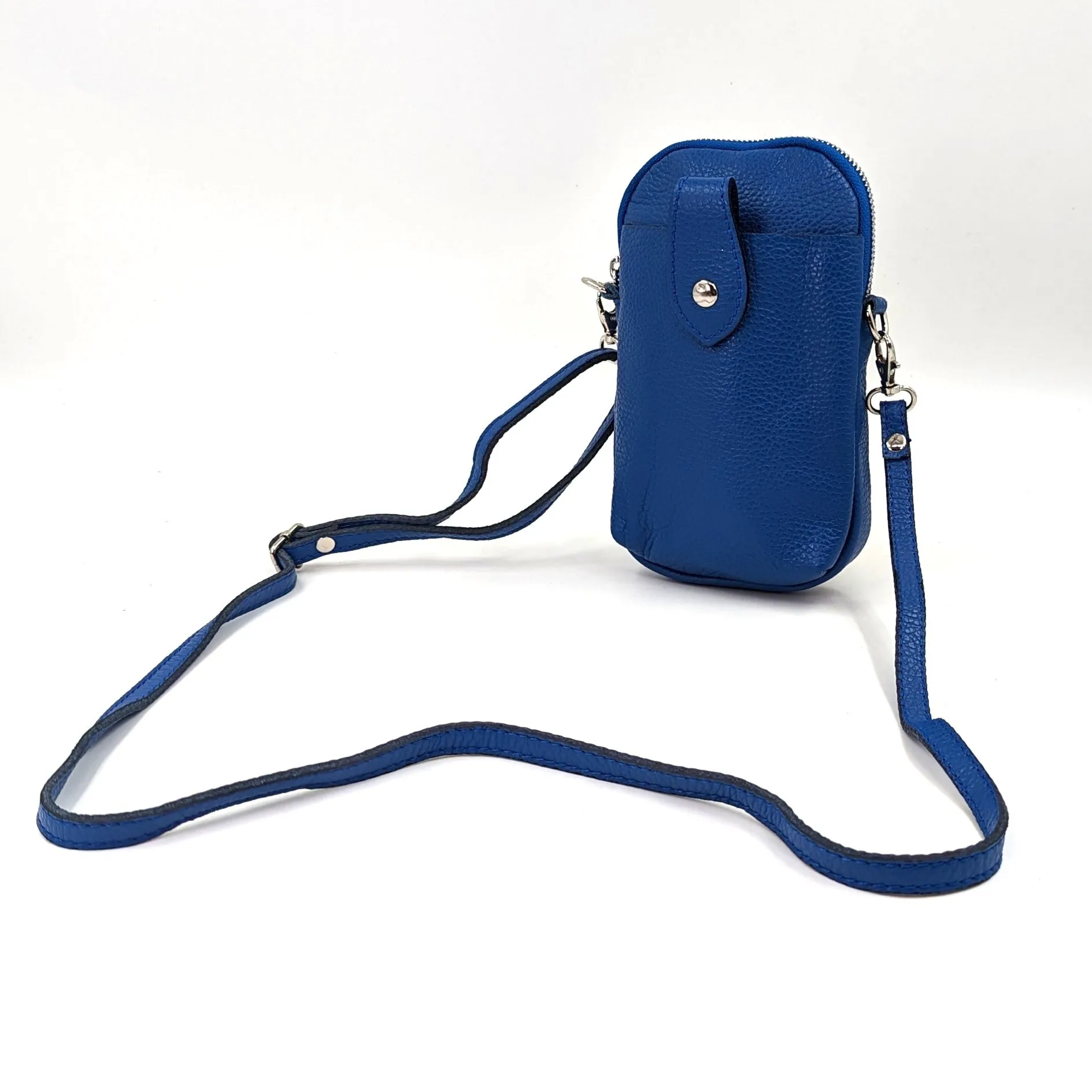 Crossbody mini leather bag with front and back compartments and poppers