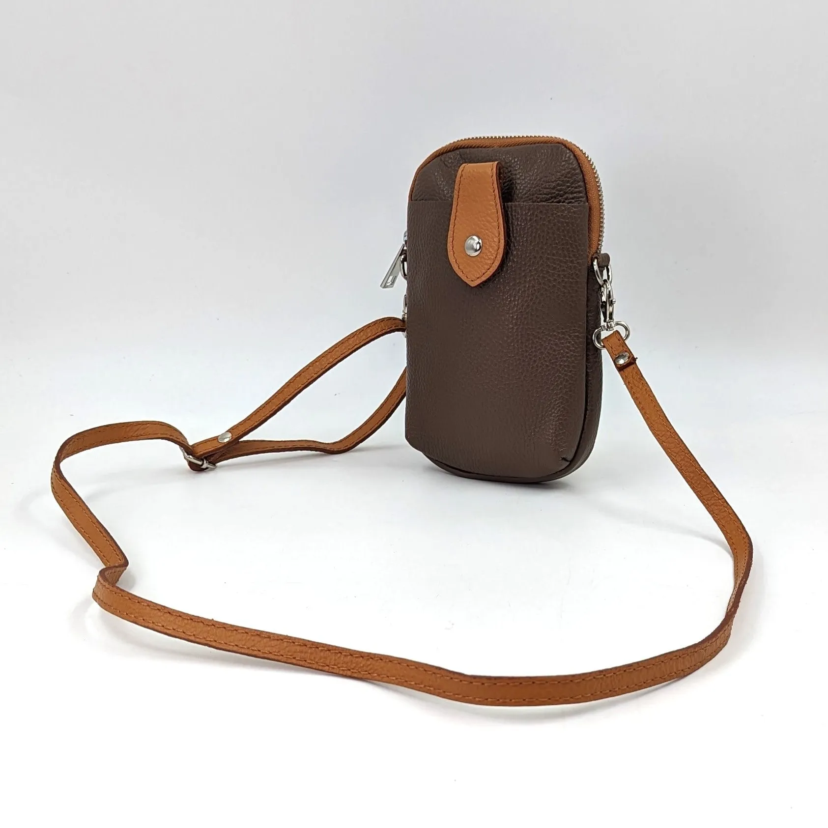 Crossbody mini leather bag with front and back compartments and poppers