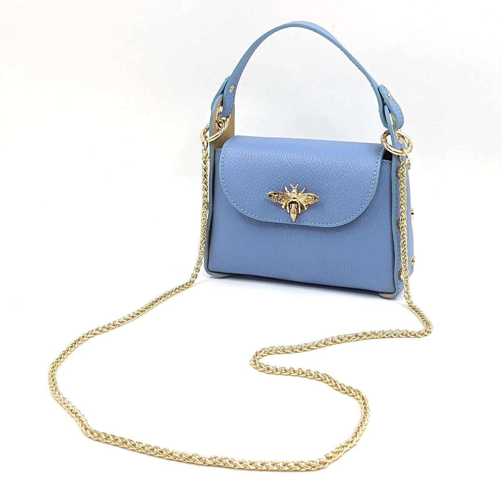 Cute leather handbag with 'Gucci' bee and studded detail on the side and crossbody strap