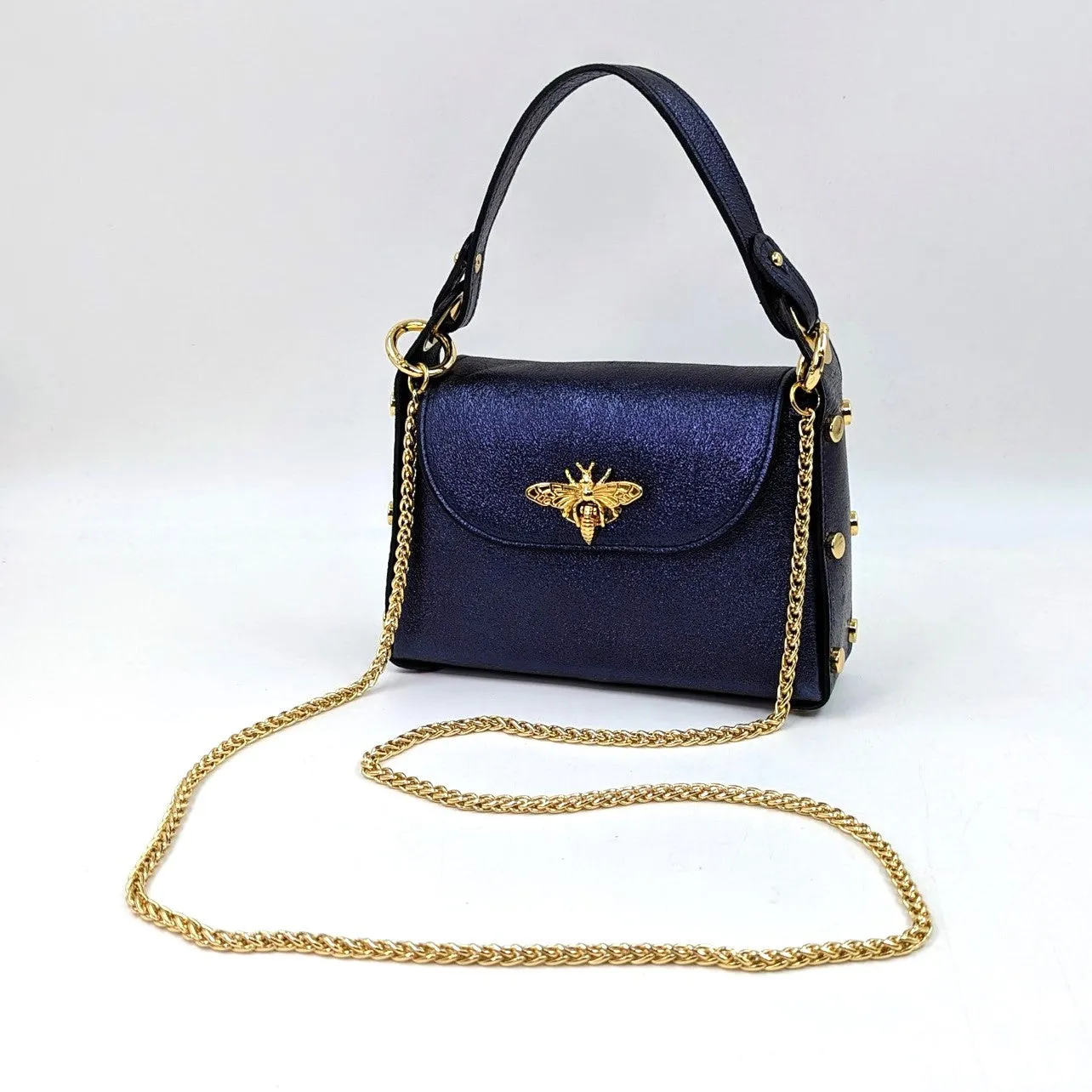 Cute leather handbag with 'Gucci' bee and studded detail on the side and crossbody strap