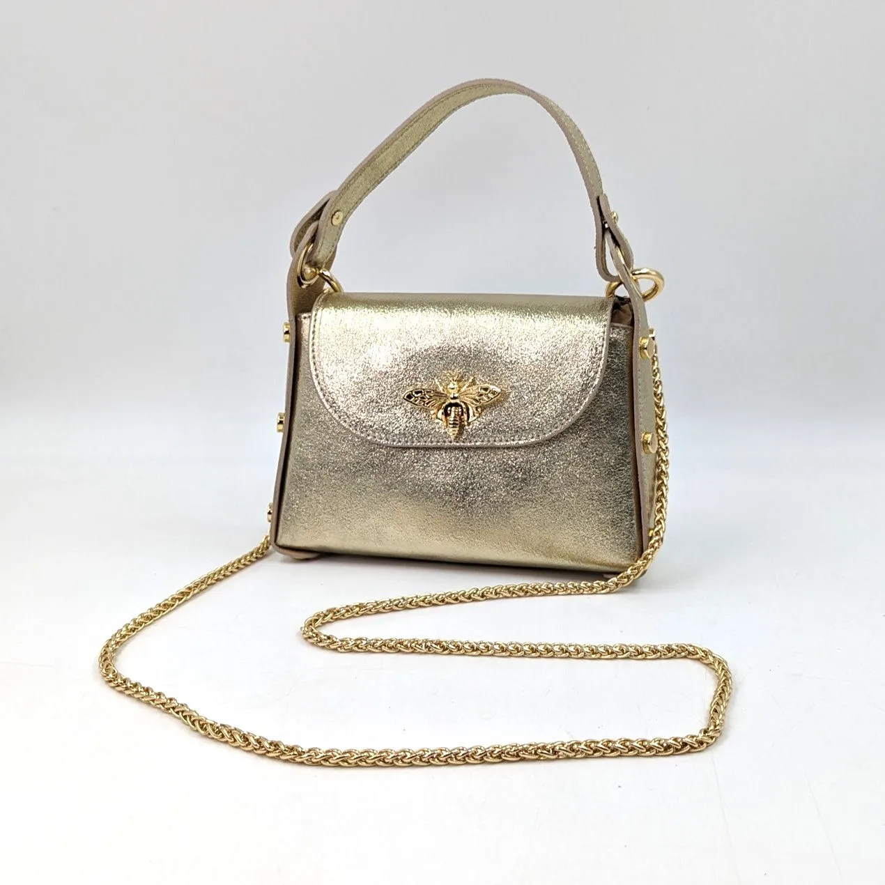 Cute leather handbag with 'Gucci' bee and studded detail on the side and crossbody strap