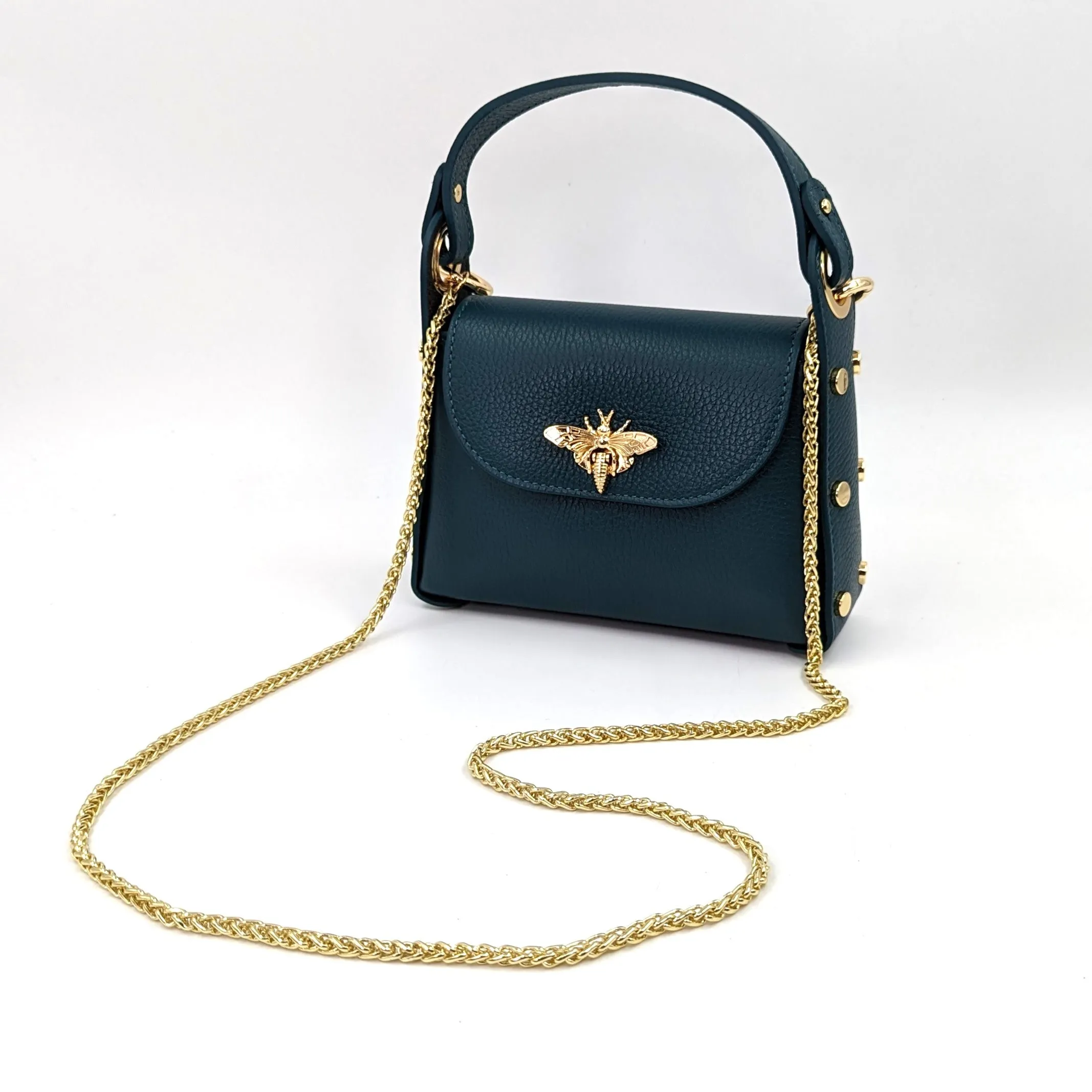 Cute leather handbag with 'Gucci' bee and studded detail on the side and crossbody strap