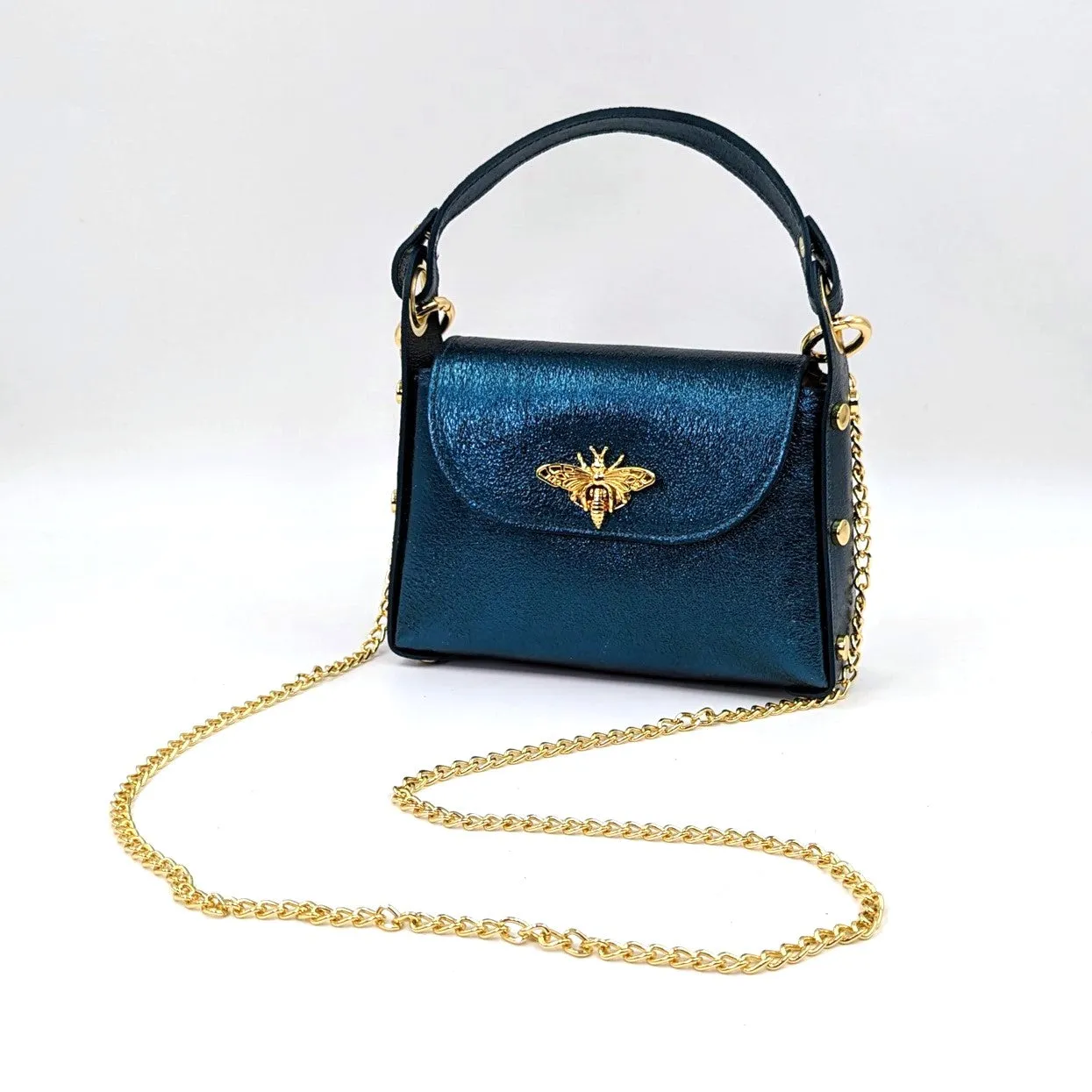 Cute leather handbag with 'Gucci' bee and studded detail on the side and crossbody strap